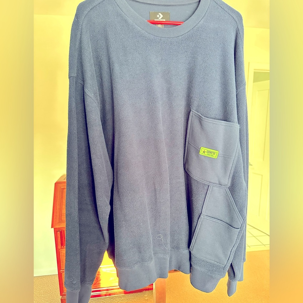 Very nice Converse sweatshirt with carpenter pants pocket design.